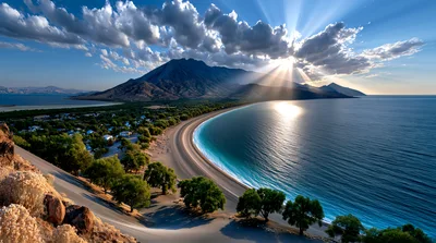 Scenic Coastal Landscape With Sunburst Over Mountains