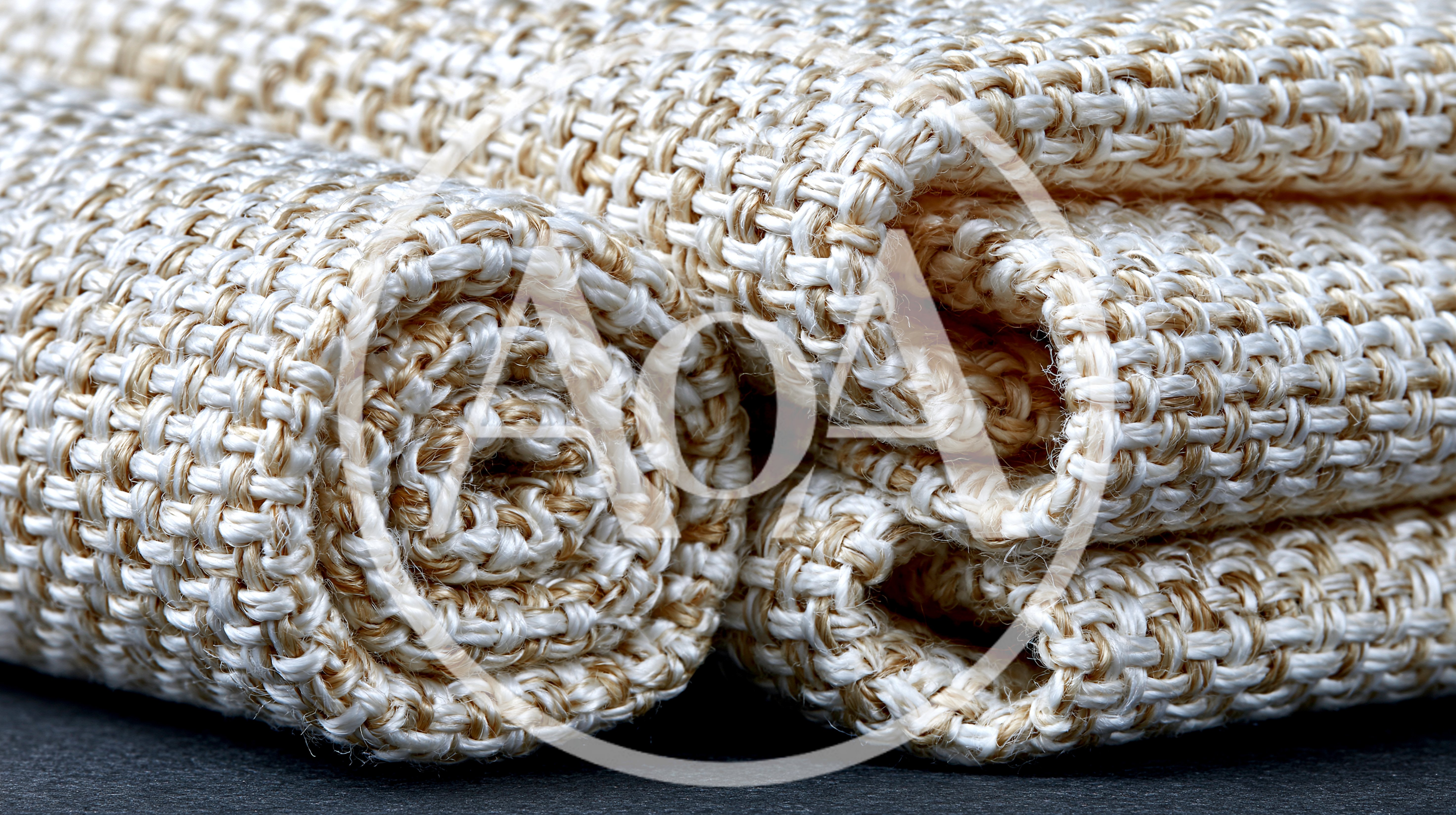 Close Up Of Rolled Natural Burlap Fabric