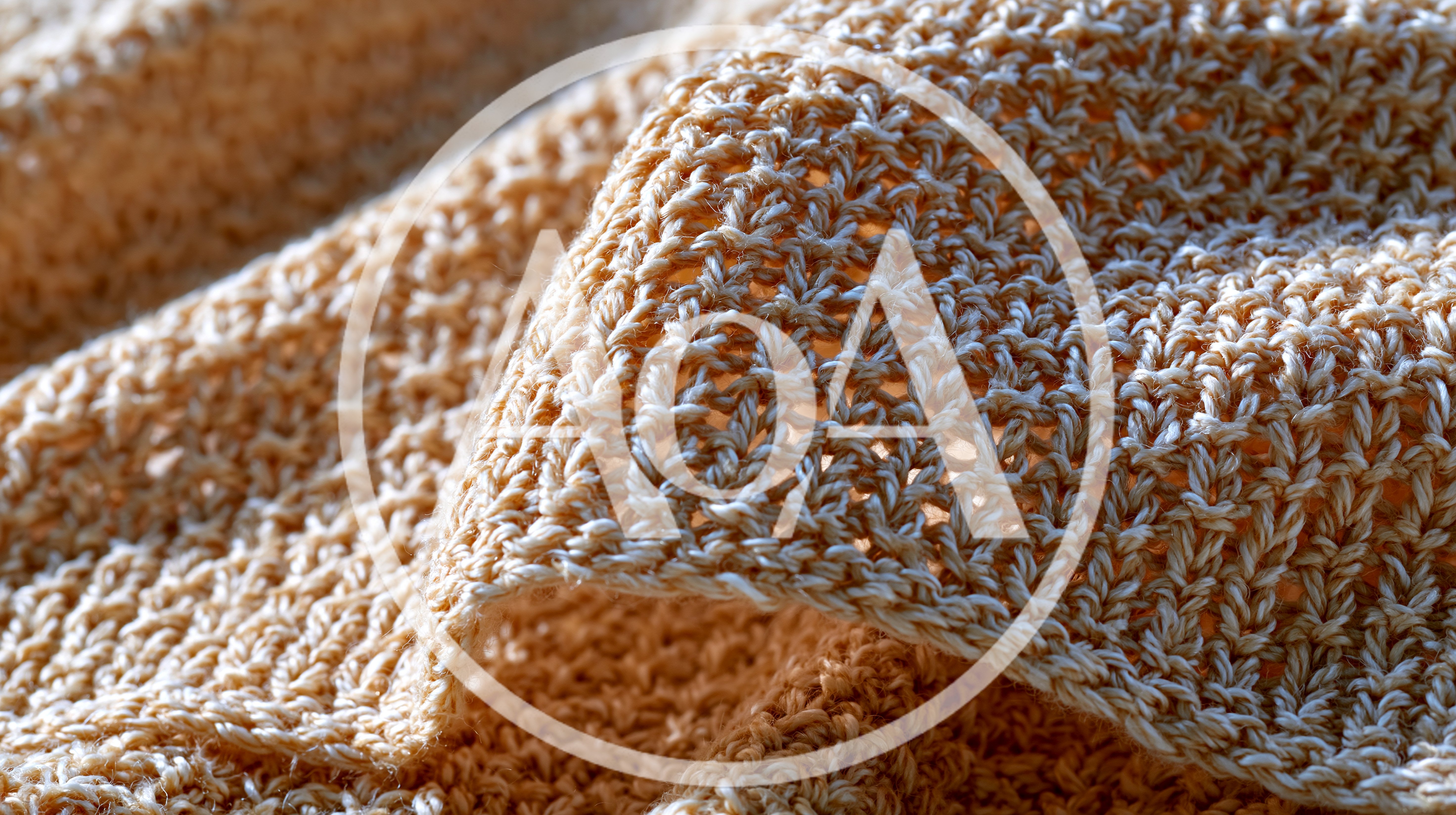Close Up Of Beige Knitted Fabric Texture