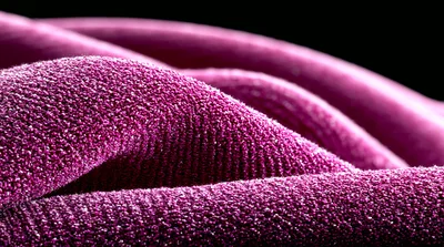 Close Up Of Purple Textured Fabric Waves
