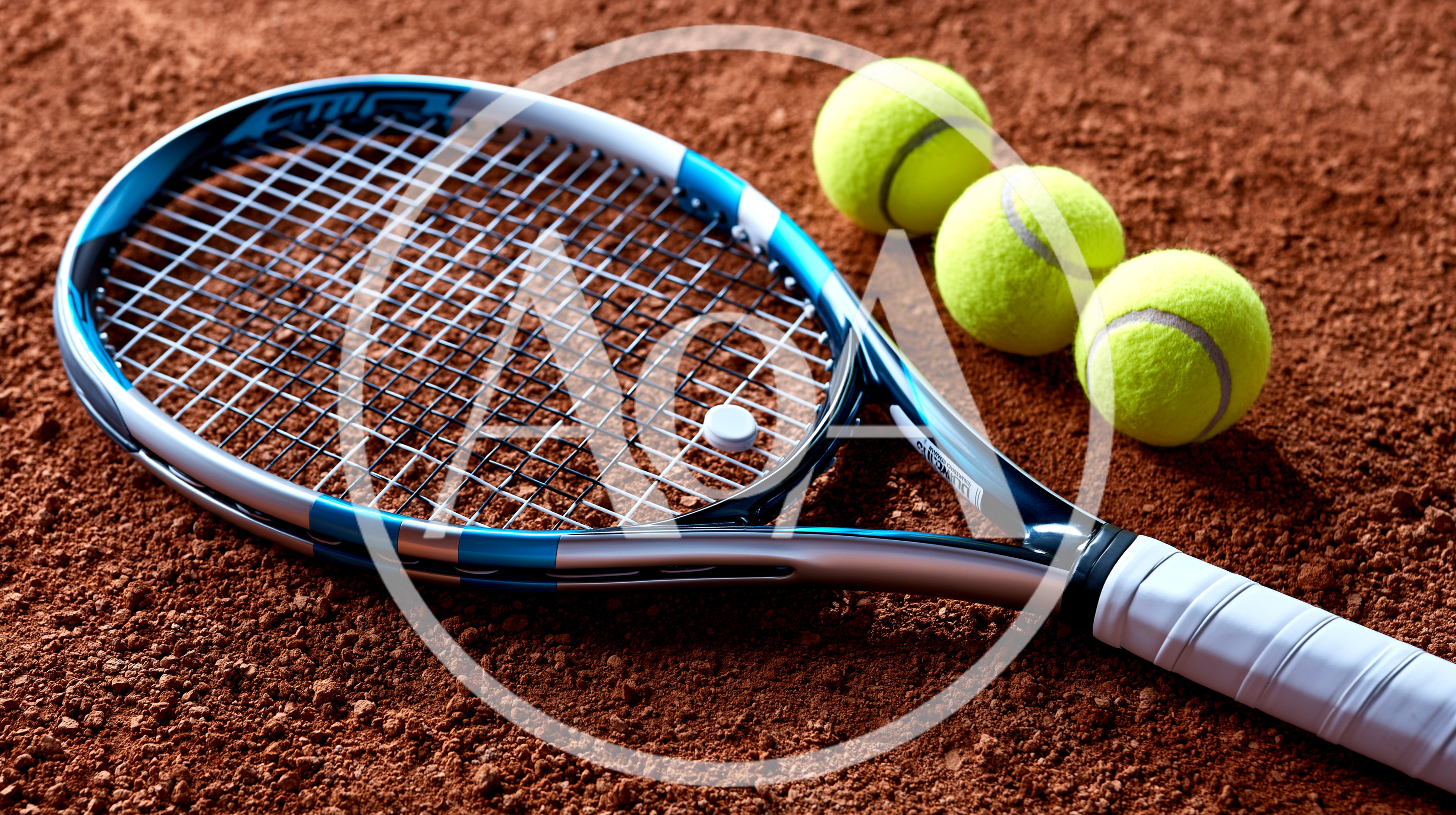 Tennis Racket And Three Balls On Clay Court