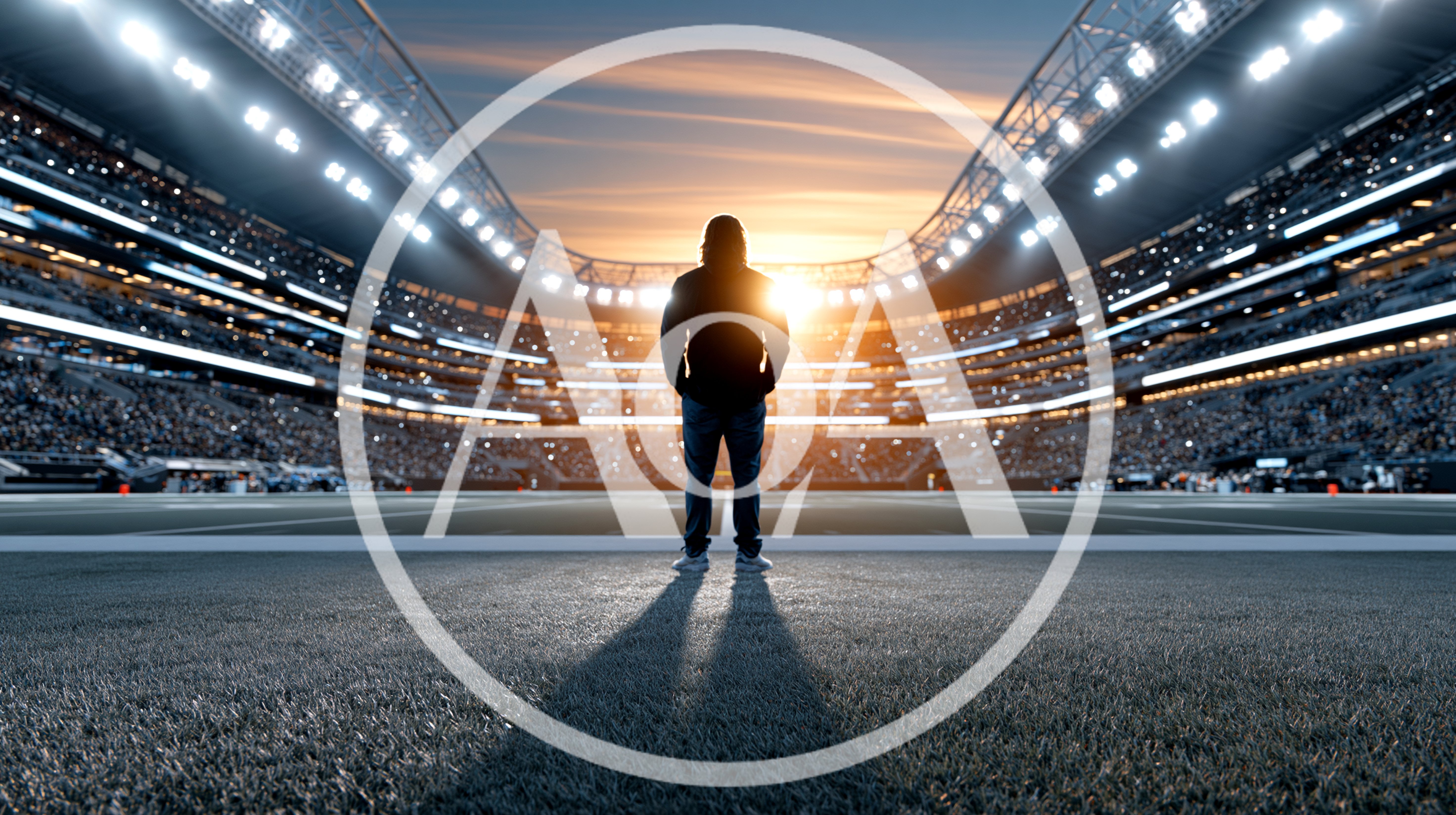Lone Person Standing In Center Of Empty Football Stadium