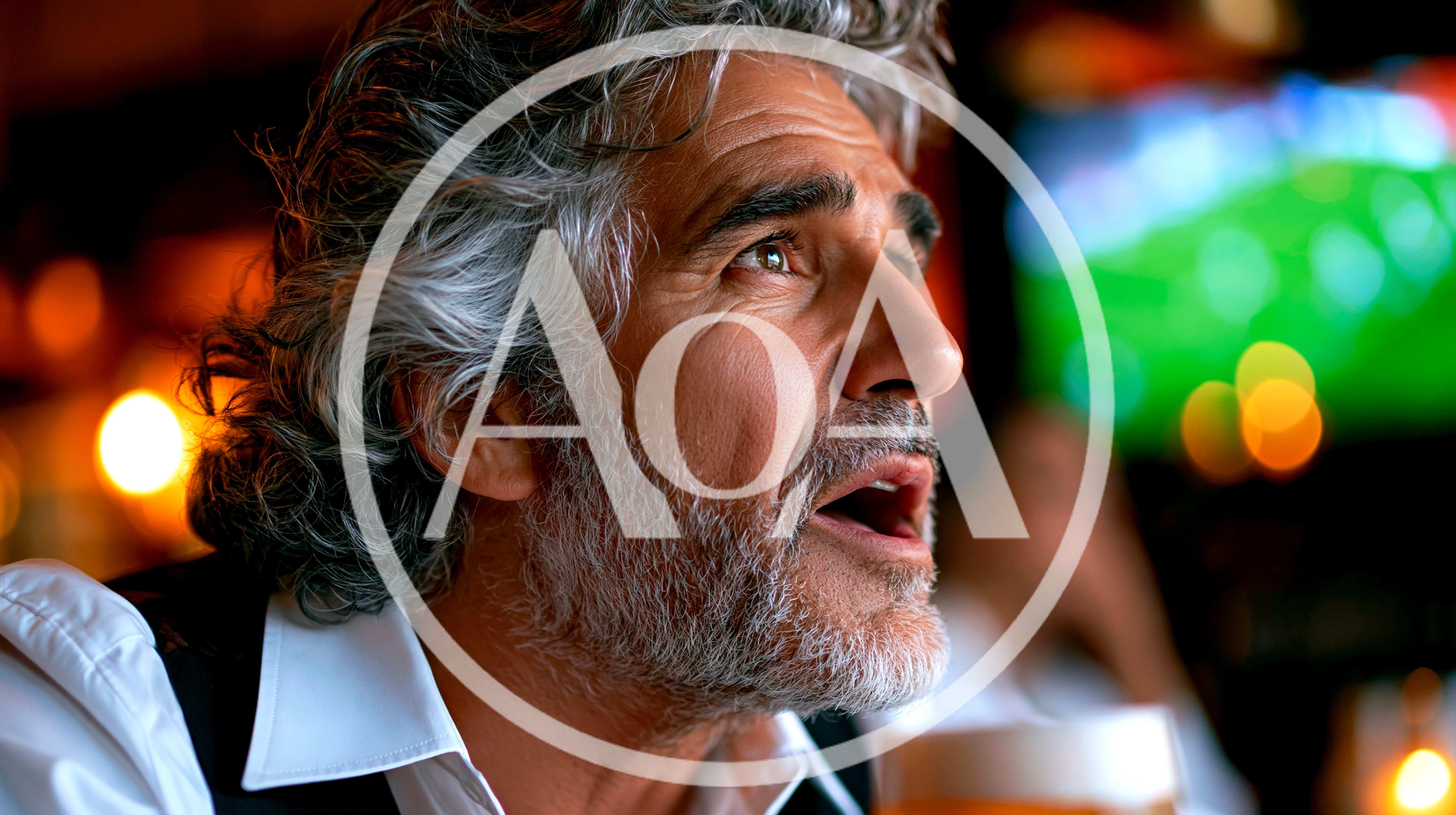 Middle Aged Man Watching Sports In A Bar