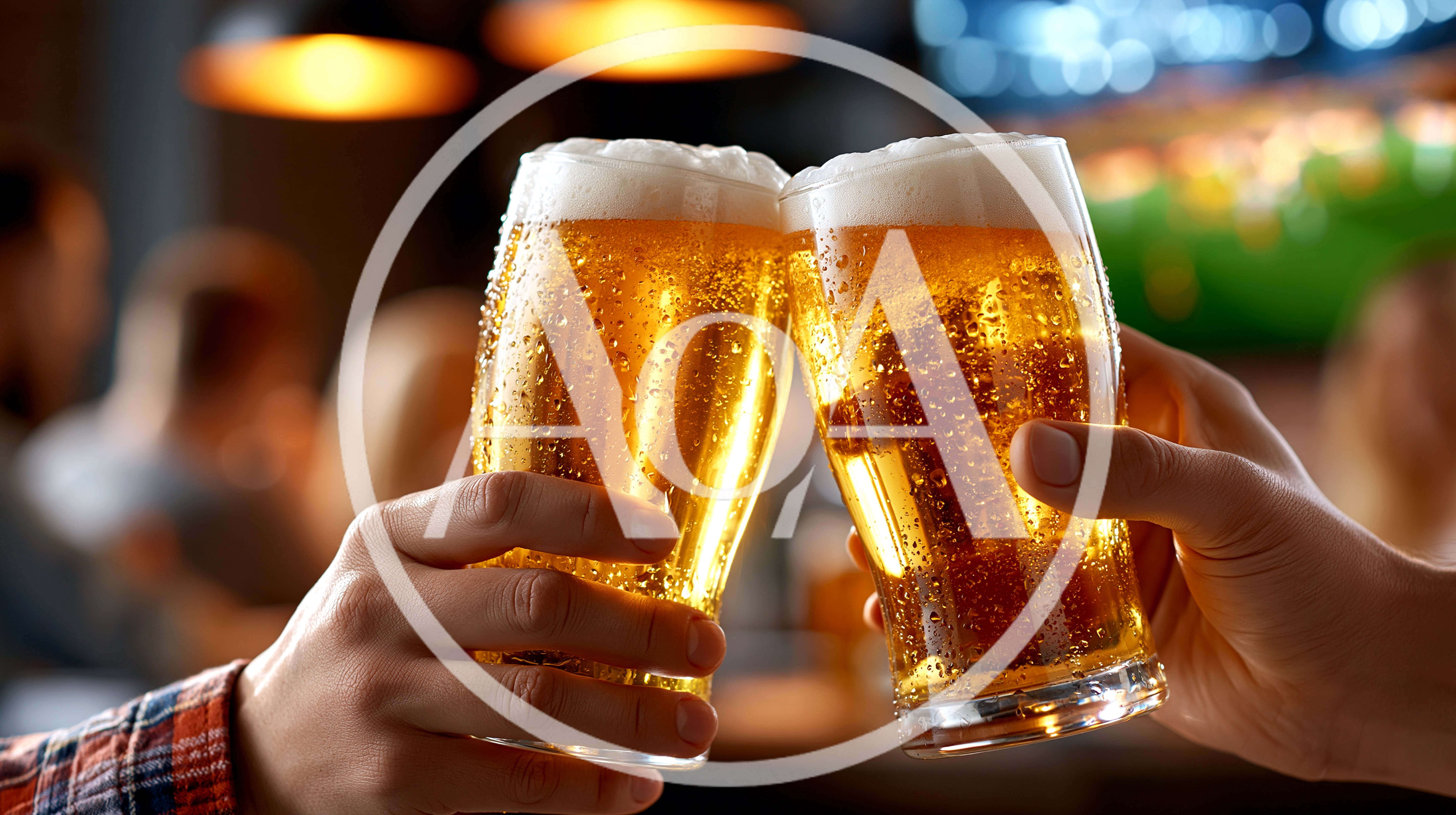 Two People Toasting With Glasses Of Cold Beer