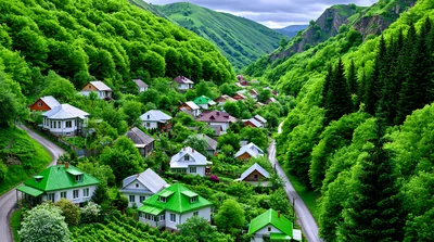 Picturesque Village Nestled In A Lush Green Mountain Valley