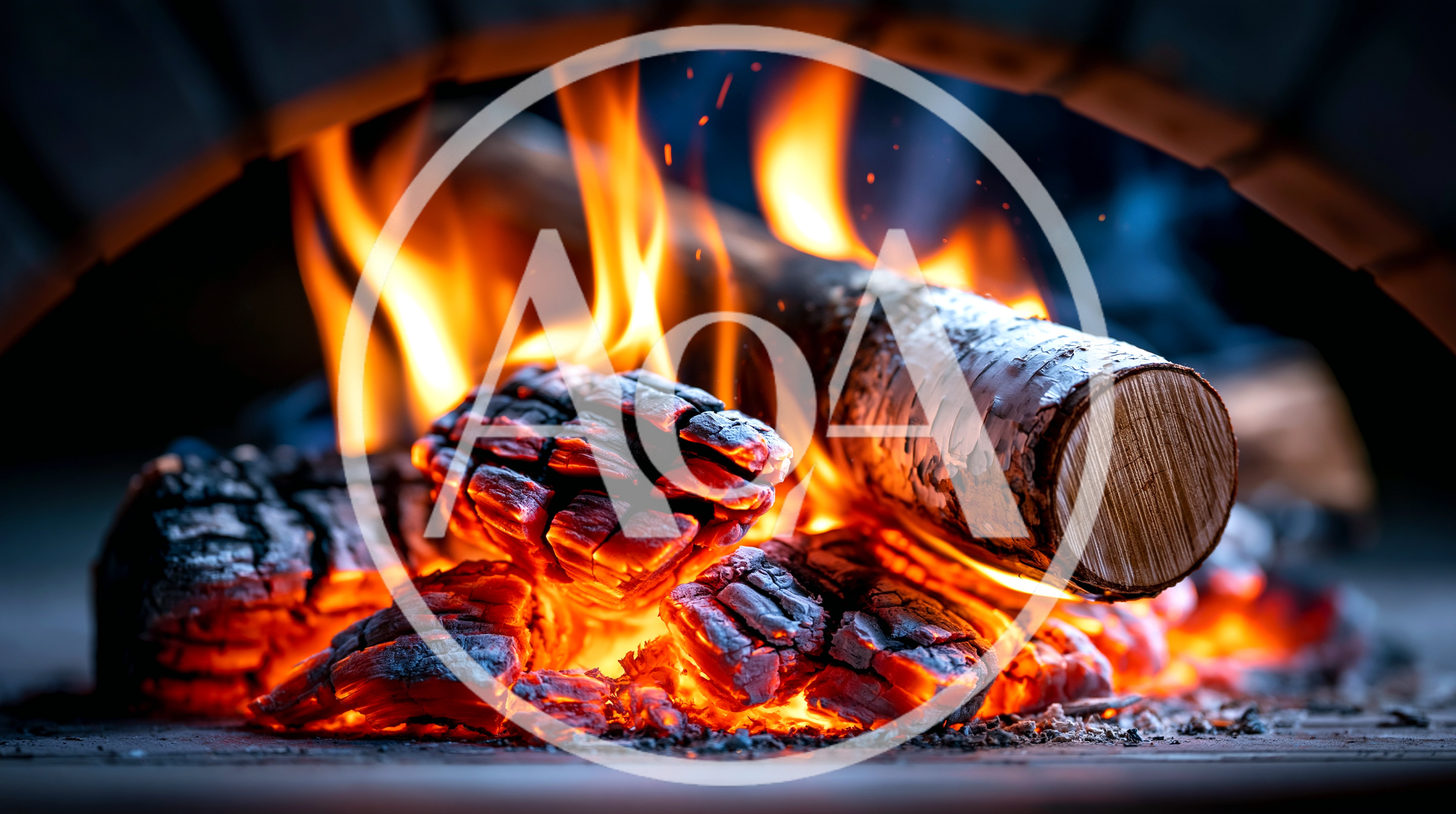 Birch Log Burning In A Brick Fireplace