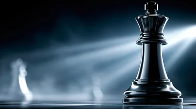 Black Chess King Piece Under Dramatic Spotlight