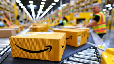 Amazon Packages Moving Along Warehouse Conveyor Belt