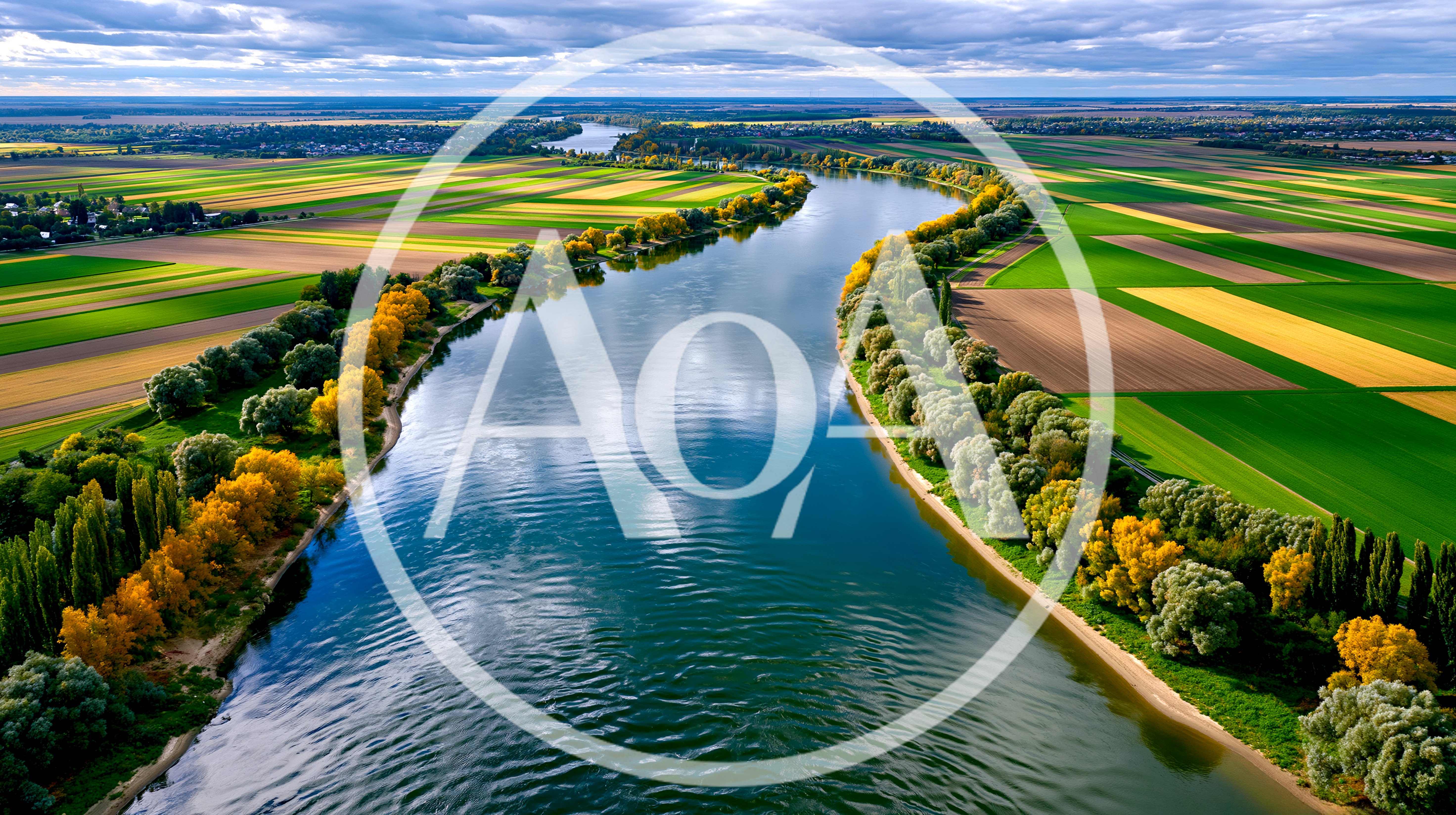 Aerial View Of A Winding River Through Agricultural Fields