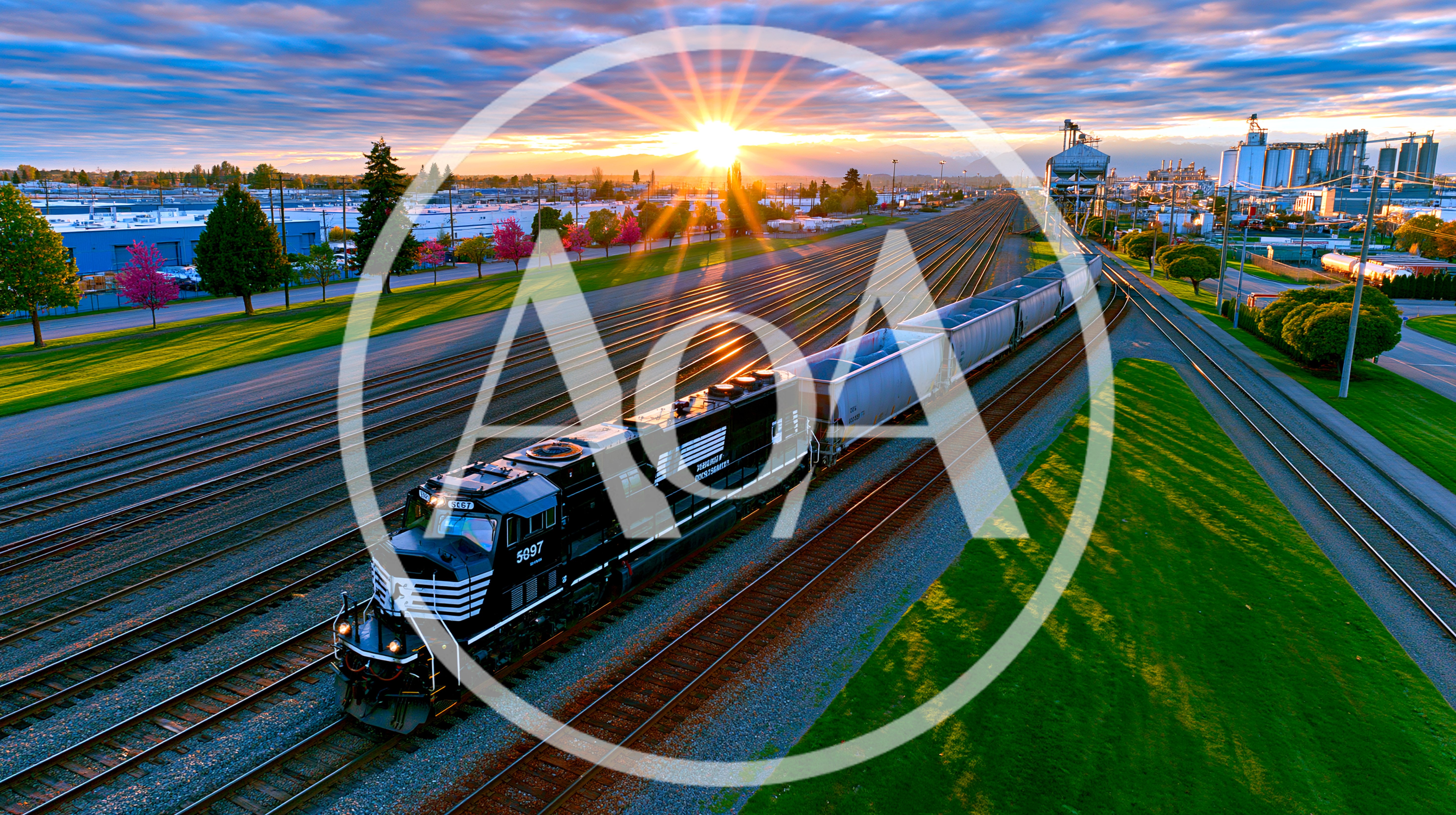 Norfolk Southern Freight Train Moving Through Industrial Rail Yard