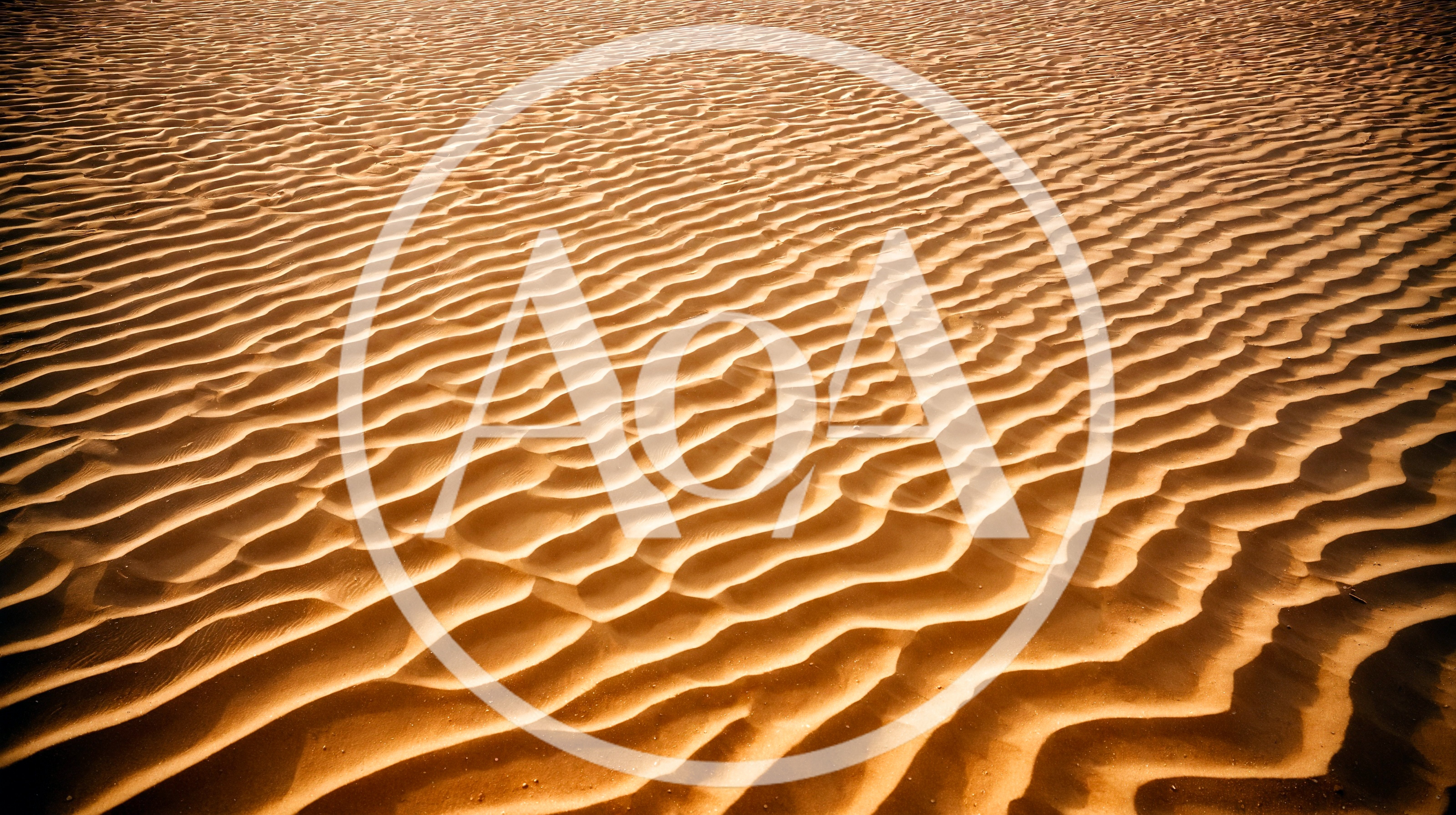 Rippled Sand Dunes Texture In The Desert