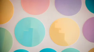 Colorful Polka Dot Pattern On White Background