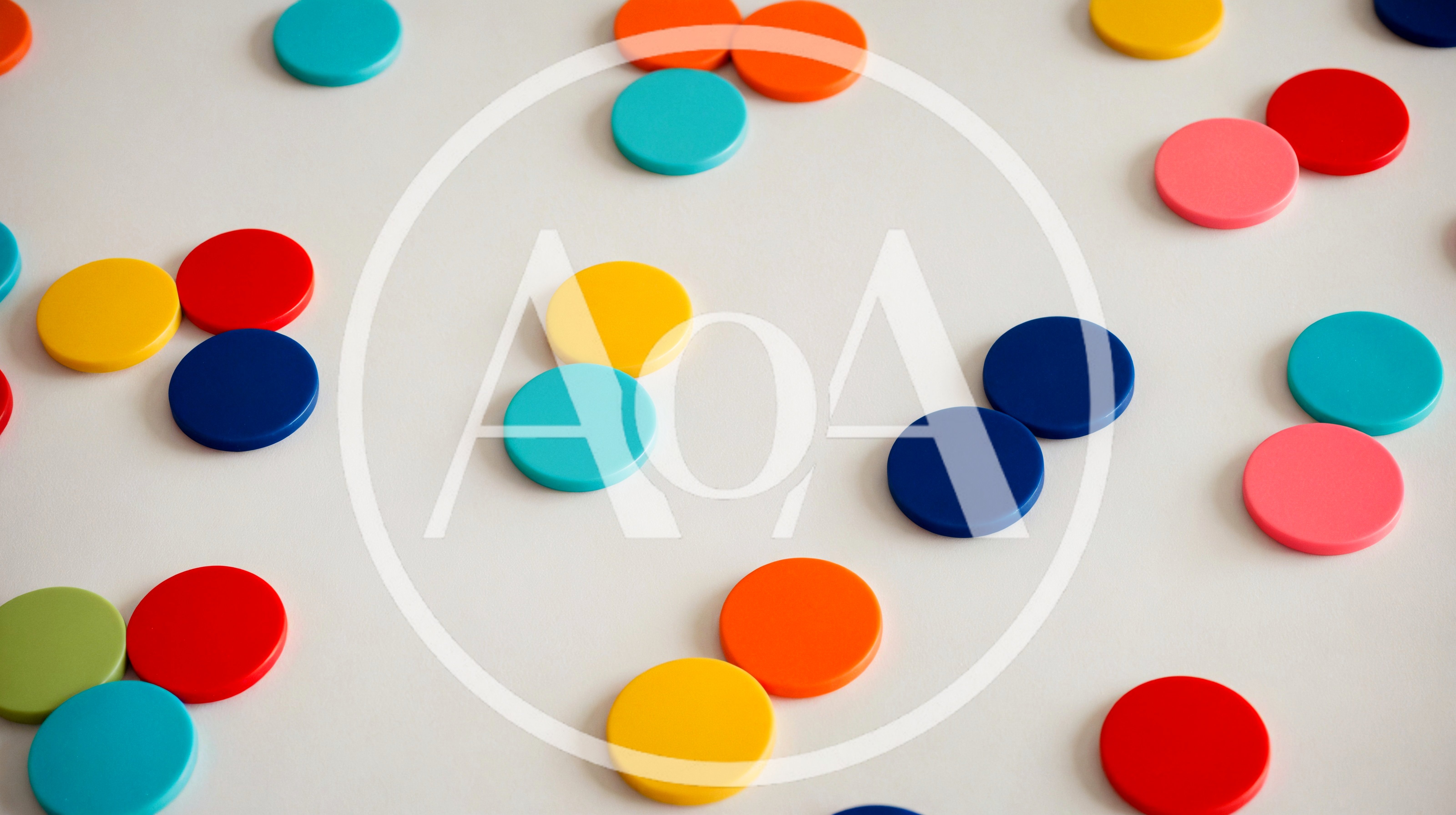 Colorful Plastic Discs Scattered on a White Surface