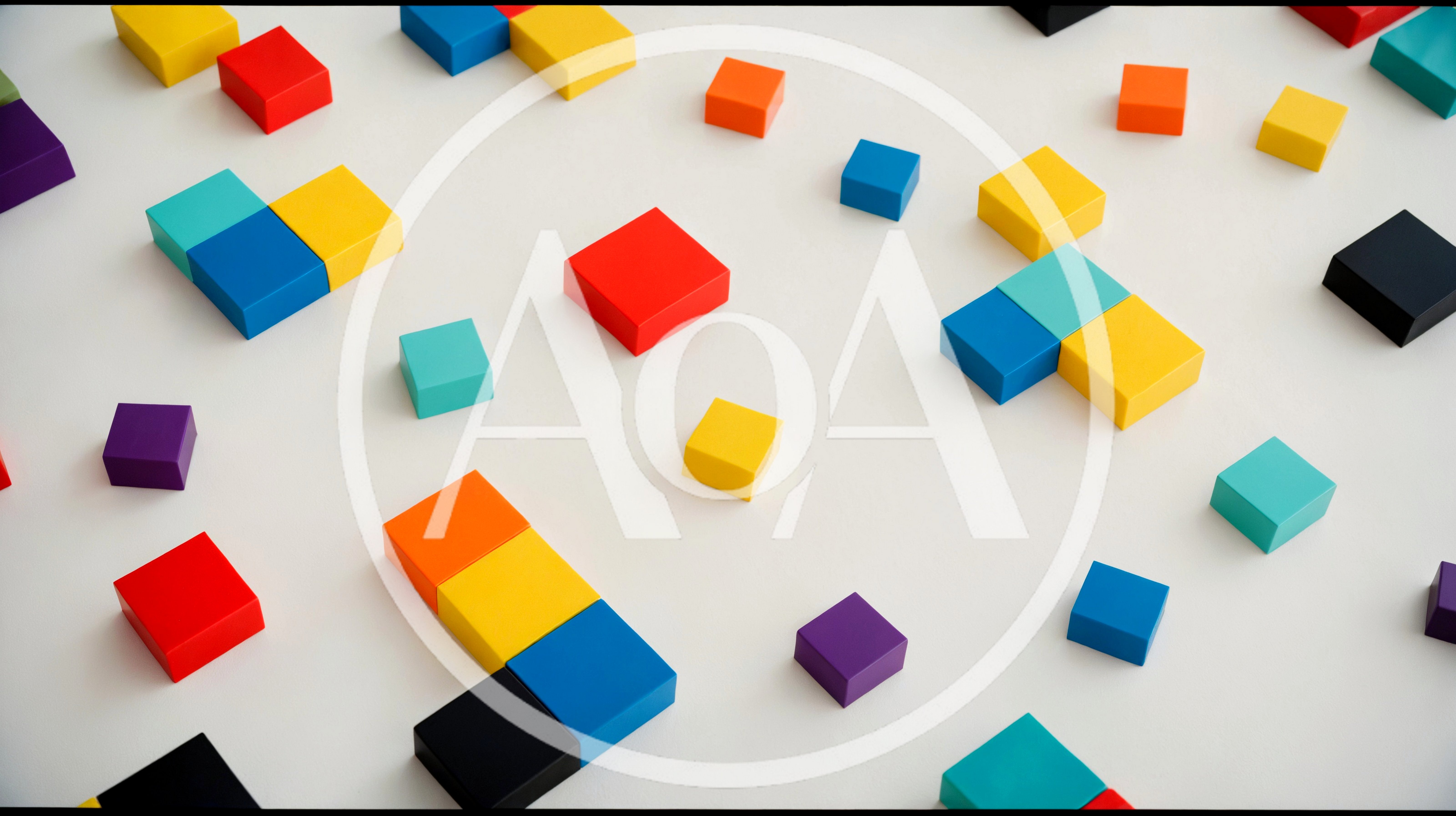 Colorful Geometric Blocks Arranged On White Surface