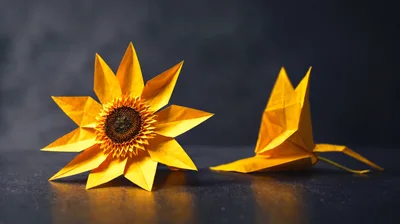 Origami Sunflower And Paper Bird On Dark Surface