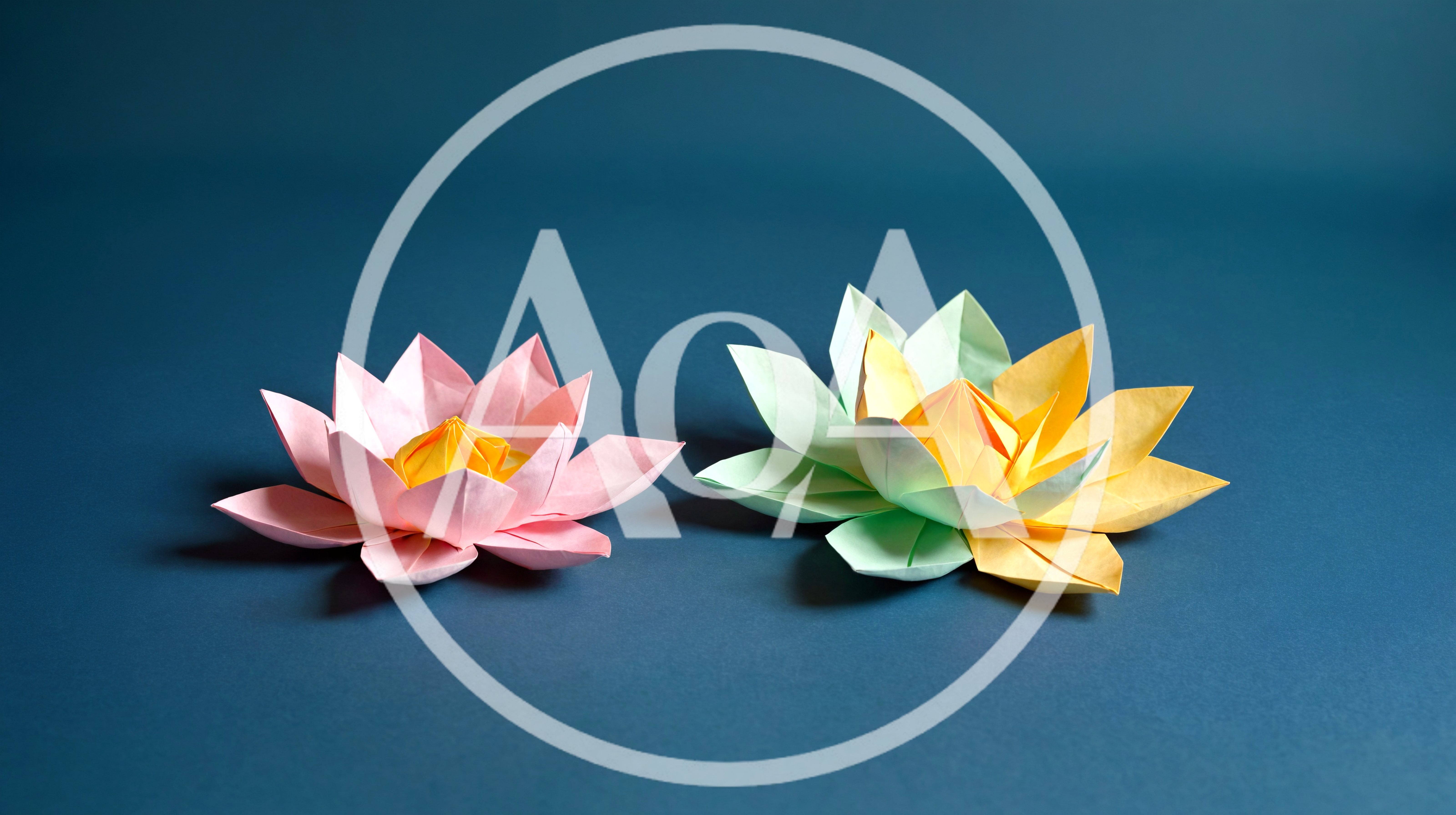 Two Handmade Origami Lotus Flowers On Blue Background