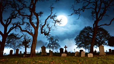 Full Moon Over A Spooky Graveyard At Night