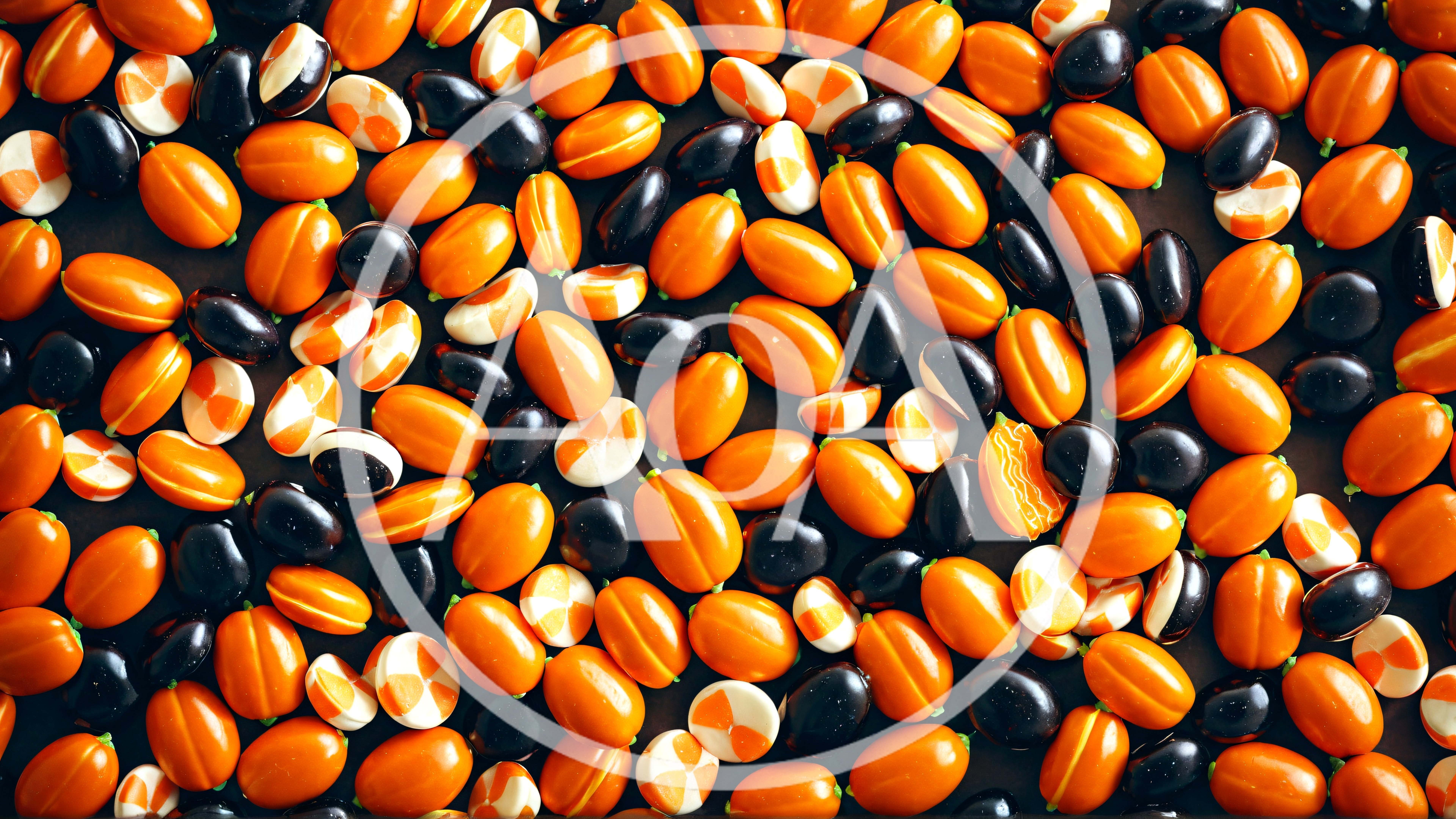 Top Down View Of Scattered Orange And Black Beads