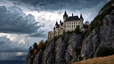 Medieval Castle Perched On A Rocky Cliffside