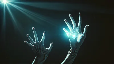 Eerie Alien Hands Reaching Upward With Glowing Energy