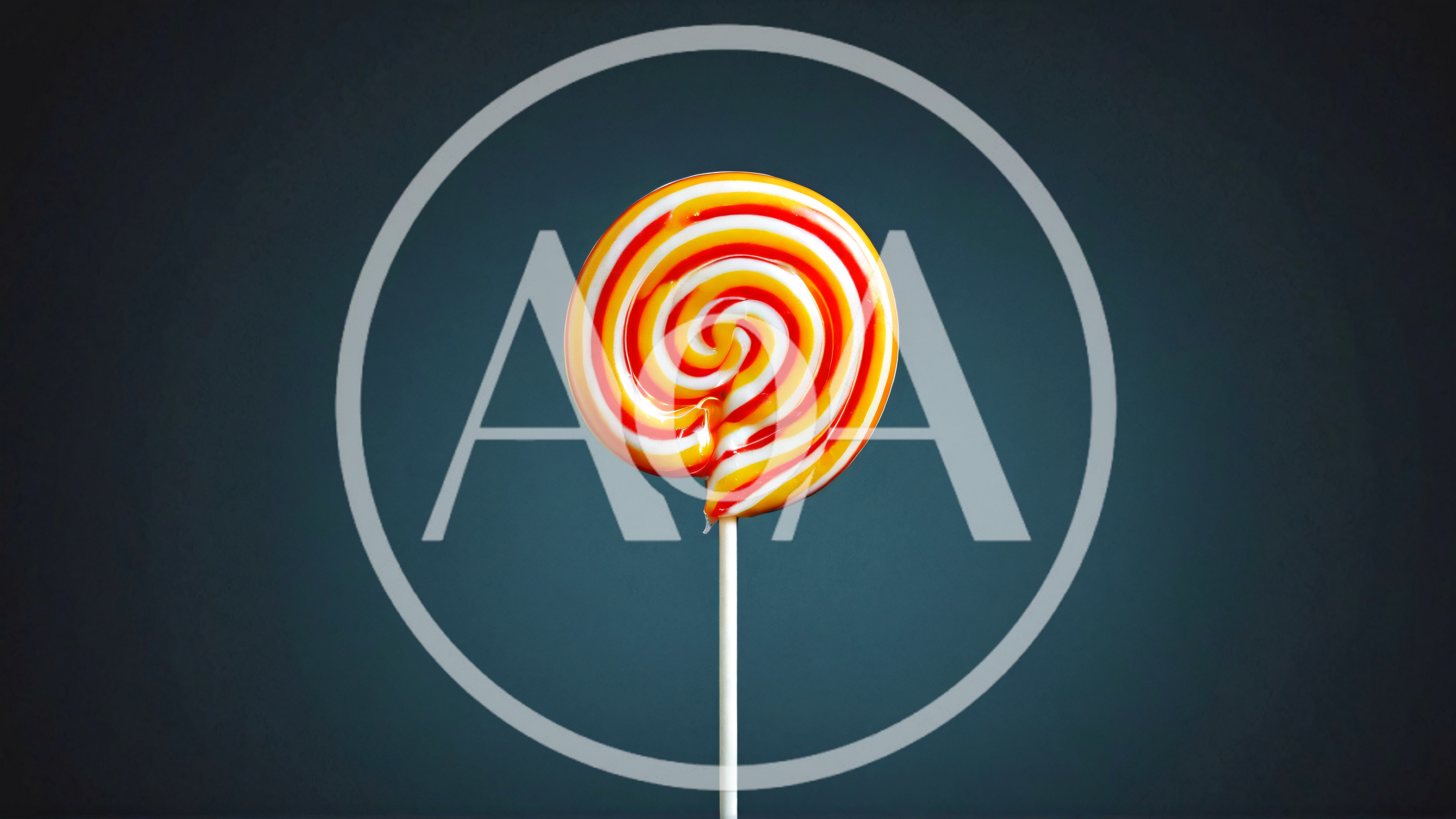 Swirled Red And Yellow Lollipop On A Stick