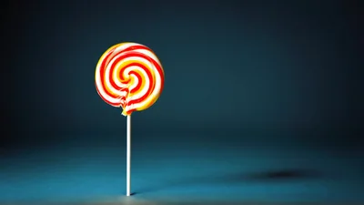 Swirled Red And Yellow Lollipop On A Stick