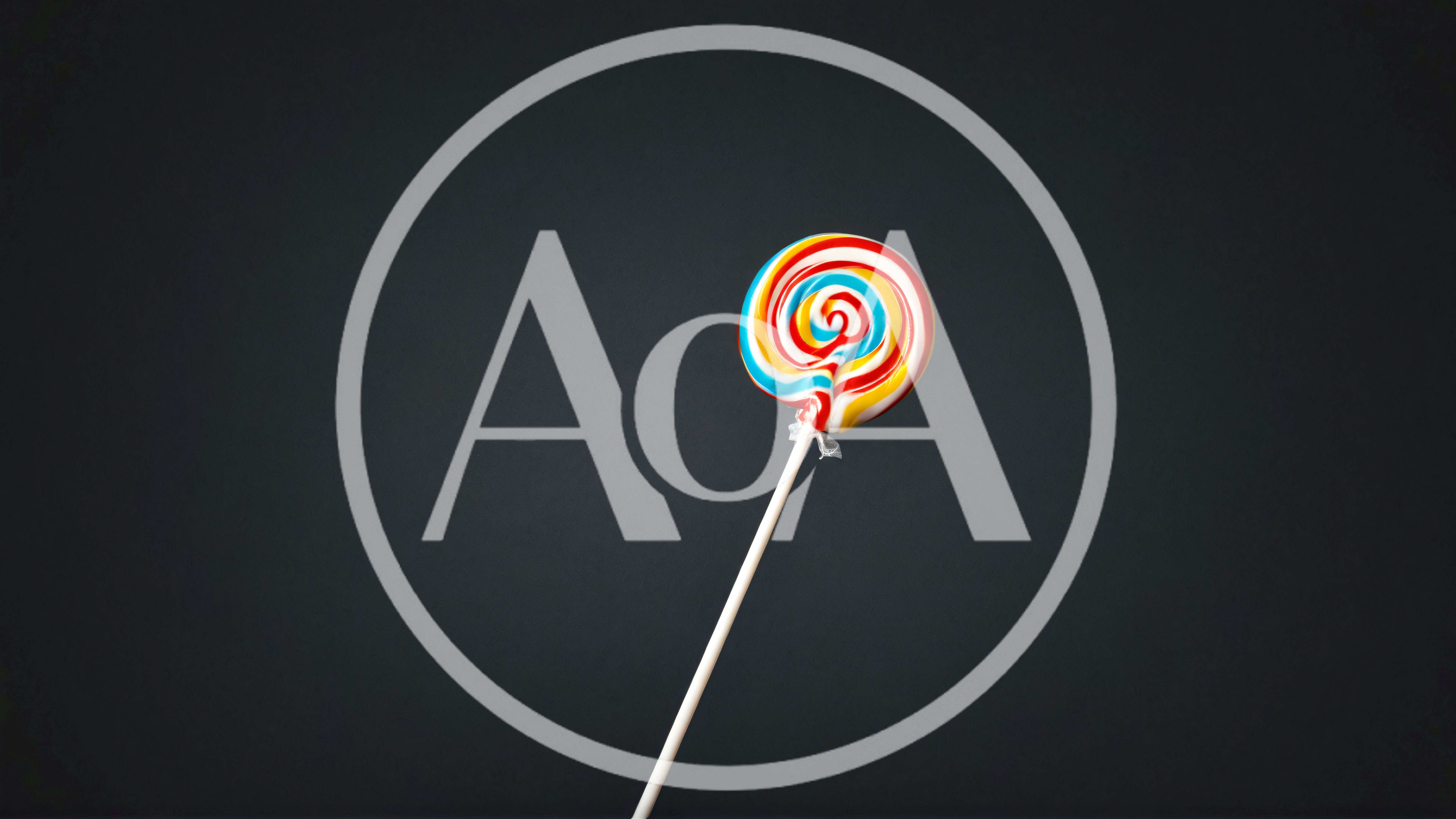 Colorful Swirl Lollipop Against Dark Background
