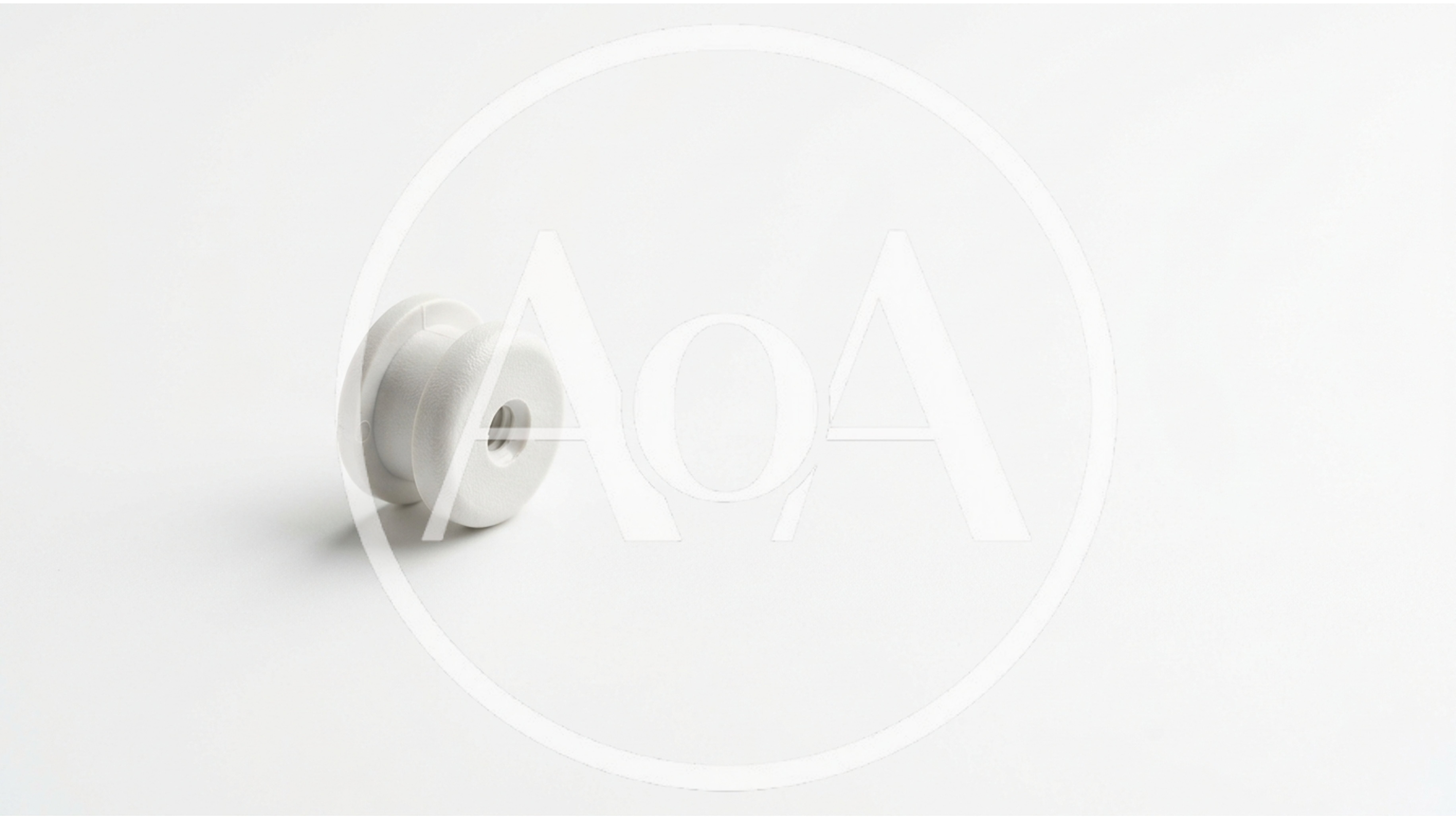 White Plastic Spool Component On White Background