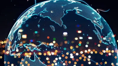 Digital Earth Globe Rotating Over Blurred City Lights