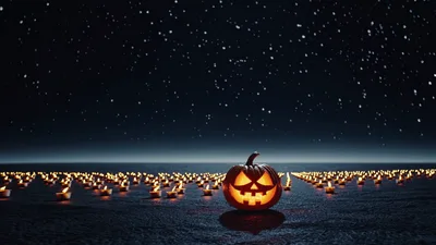 Jack O Lantern Pumpkin Glowing Amidst Many Candles