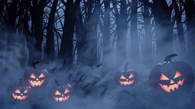 Glowing Jack O Lanterns In A Misty Dark Forest