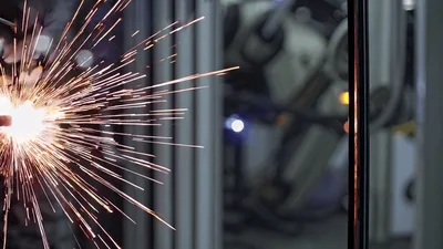 Industrial Robotic Arm Performing Precision Metal Welding