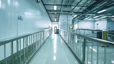 Modern Industrial Facility Walkway With Stainless Steel Railings