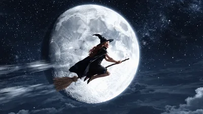 Witch Flying On Broomstick Against Full Moon