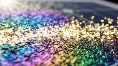 Abstract Rainbow Solar Panel Surface With Glowing Particles