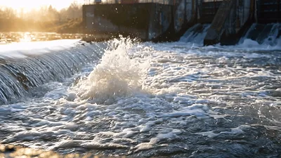 Water Bubbling Up In A River Weir