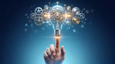 Human Finger Touching Glowing Light Bulb With Internal Gears