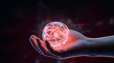 Human Hand Holding Glowing Neural Network Sphere