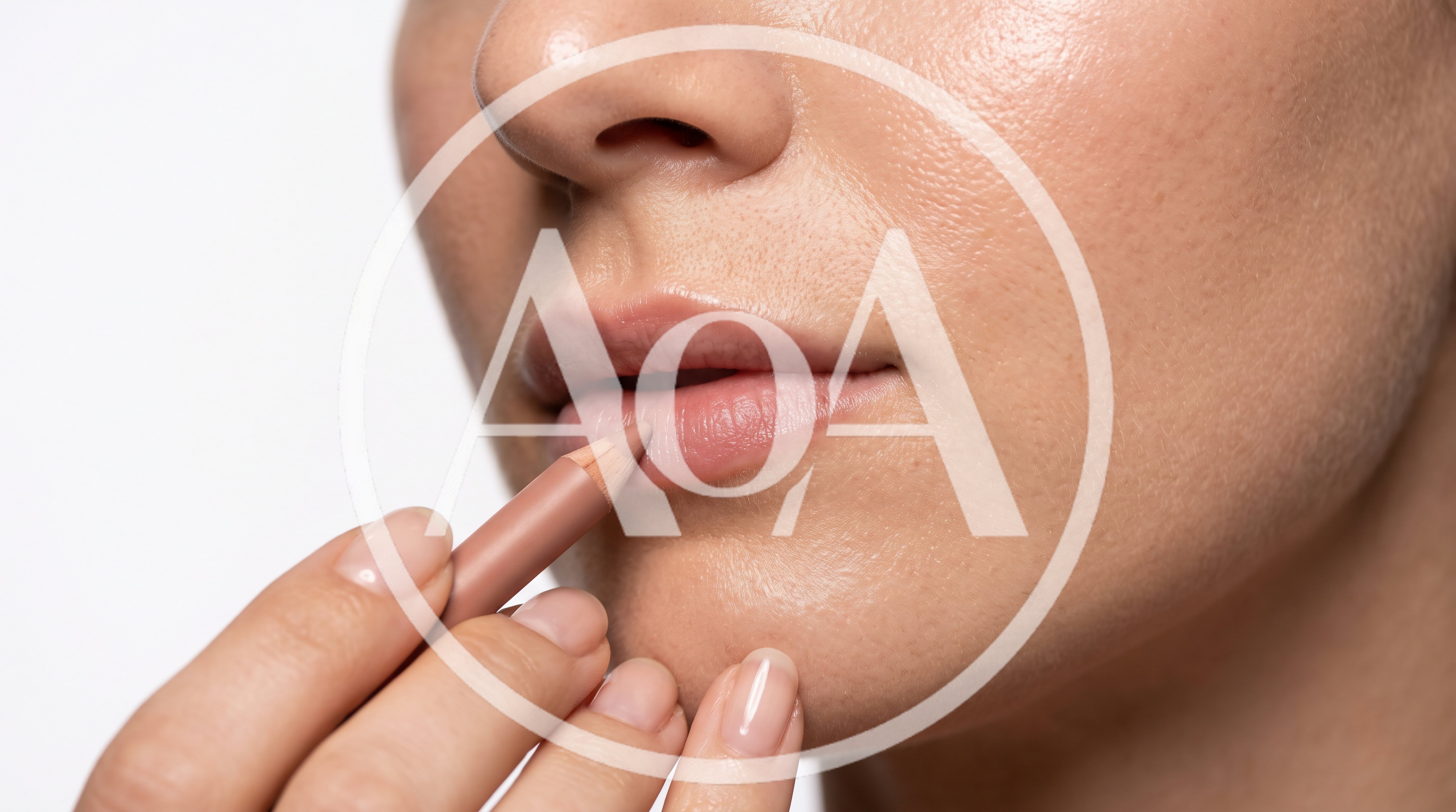 Woman Applying Nude Lip Liner To Lips