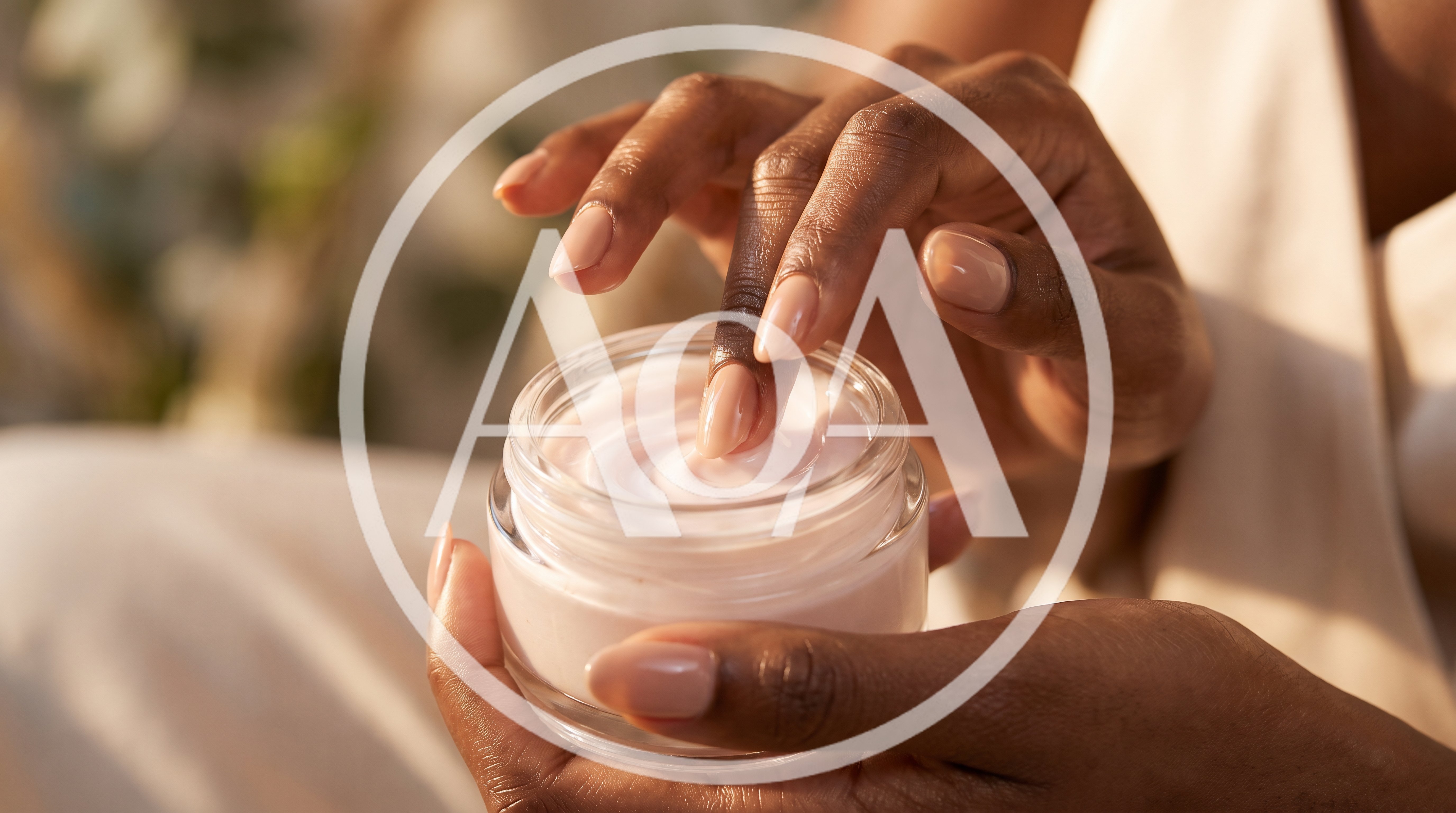 Close Up Of Woman Applying Face Cream