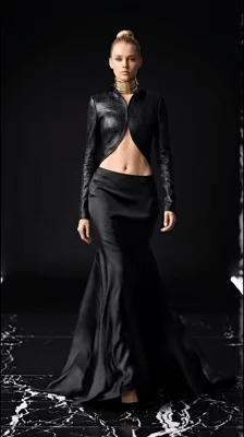 Fashion Model Walking In Black Leather Jacket And Skirt