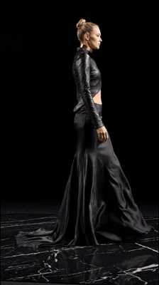 Fashion Model Walking in Black Leather Outfit