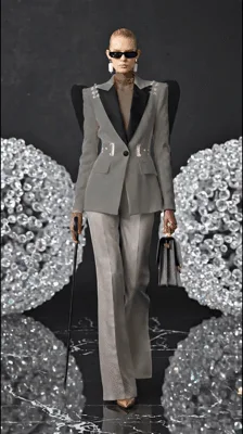 Fashion Model Walking In Various Designer Outfits