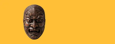 Traditional Wooden Japanese Hannya Mask Isolated On Yellow