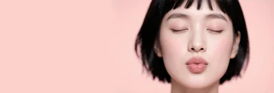 Young Woman With Short Hair Pouting Lips