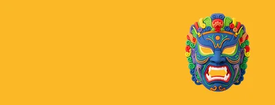 Colorful Traditional Tibetan Mask On Yellow Background