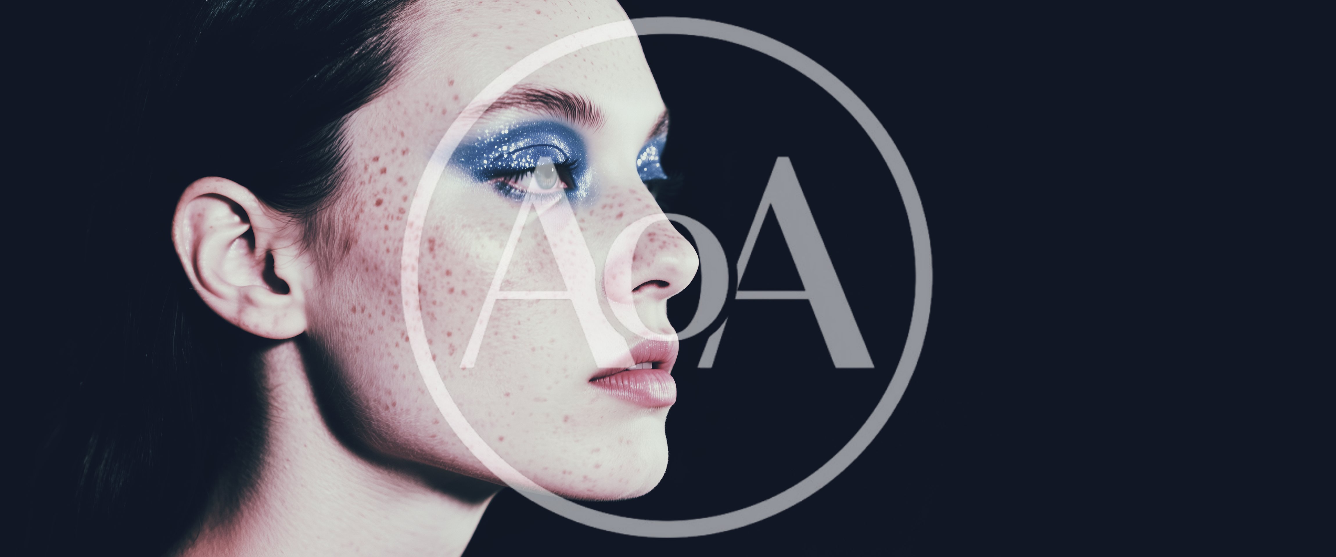 Portrait Of A Young Woman With Glittery Blue Eyeshadow