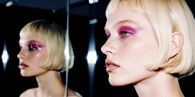 Portrait Of A Woman With Glittery Pink Eyeshadow