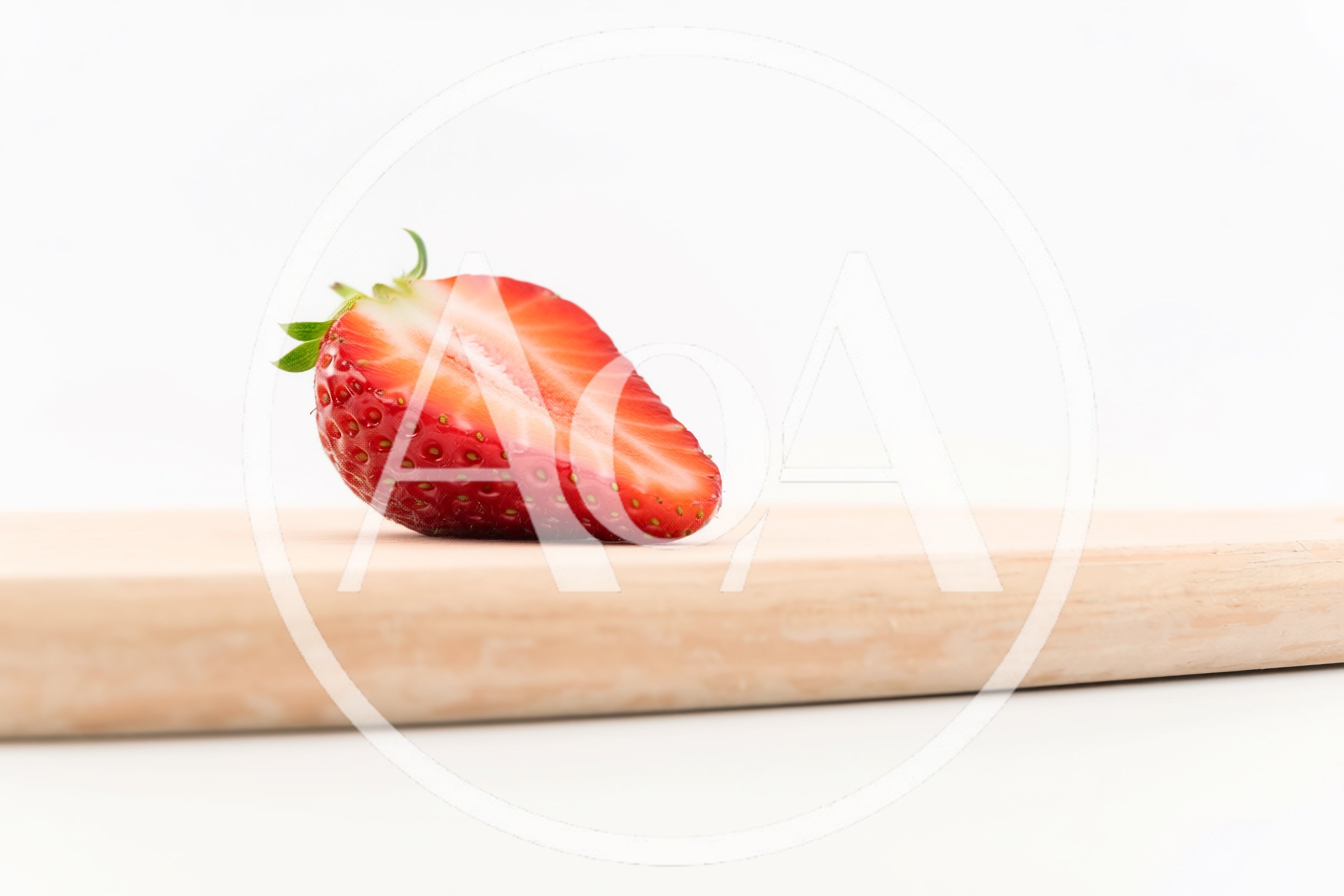Fresh Strawberry Half On A Wooden Cutting Board