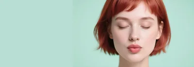 Portrait Of A Young Woman With Red Hair
